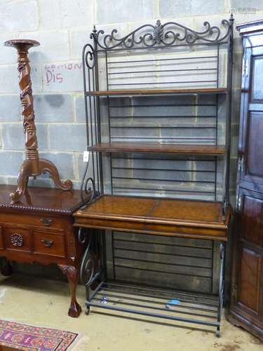 A reproduction leather mounted baker's rack, width 102cm dep...