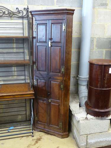 A George III oak standing corner cabinet, width 70cm depth 3...