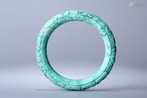 A Carved Cloud Pattern Turquoise Bangle