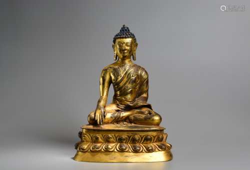 A Gilt Bronze Sakyamuni Figure Statue