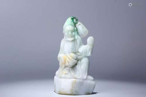 A Carved Man Jadeite Figure