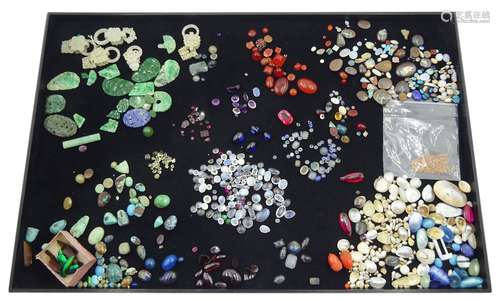 Collection of loose gemstones including four cabochon sapphi...