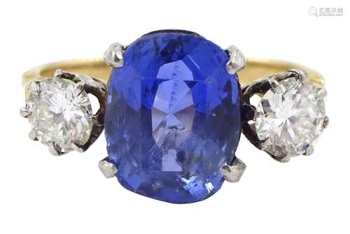 Gold three stone oval sapphire and round brilliant cut diamo...