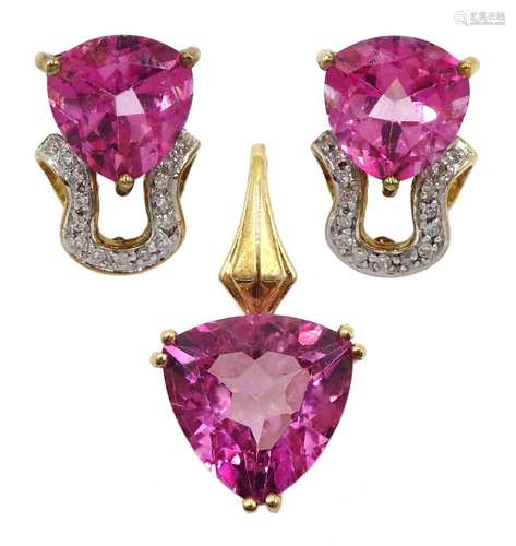 Pair of gold trillion cut flamingo topaz and and diamond stu...