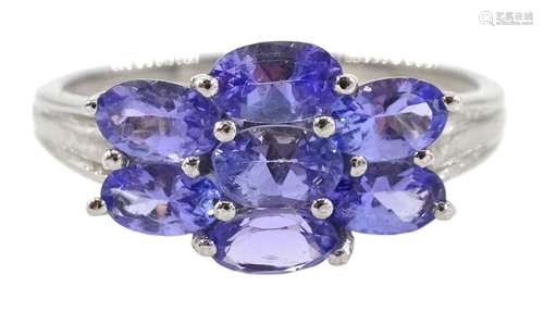 White gold seven stone oval tanzanite cluster ring