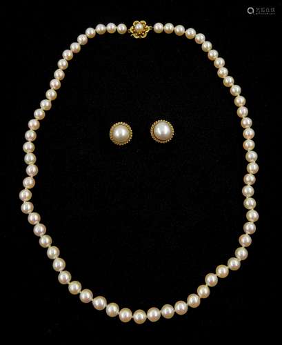 Single strand peach/white pearl necklace