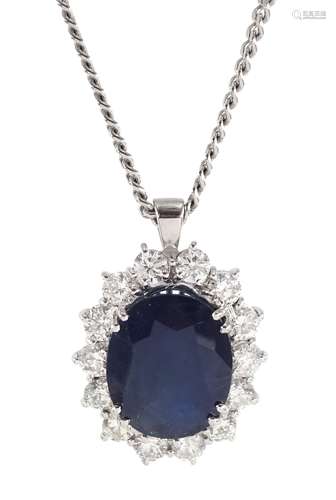 18ct white gold oval sapphire and round brilliant cut diamon...