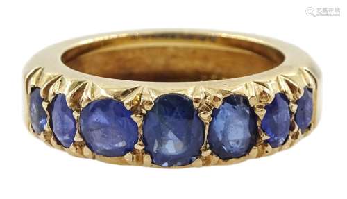 Gold graduating seven stone vari-cut sapphire ring