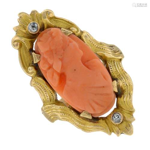 A coral cameo and diamond dress ring.Stamped 10K.Ring size J...