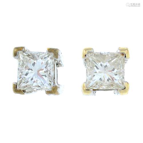 A pair of square-shape diamond single-stone stud earrings.Es...