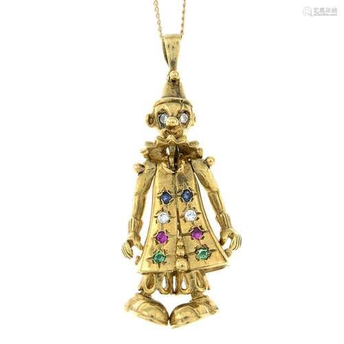 A 9ct gold gem-set clown pendant, suspended from a 9ct gold ...