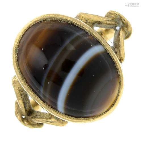 A child's banded agate single-stone ring.Ring size D.