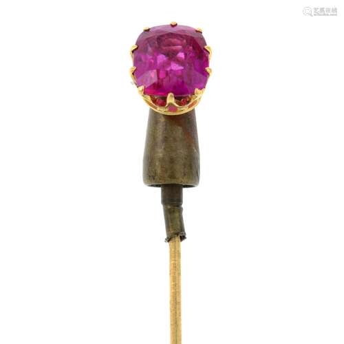 A synthetic ruby stickpin.Length of stickpin head 0.9cm.