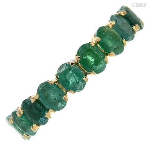 An emerald full eternity ring.Stamped 14K.