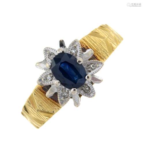 An 18ct gold sapphire and diamond floral ring.Hallmarks for ...