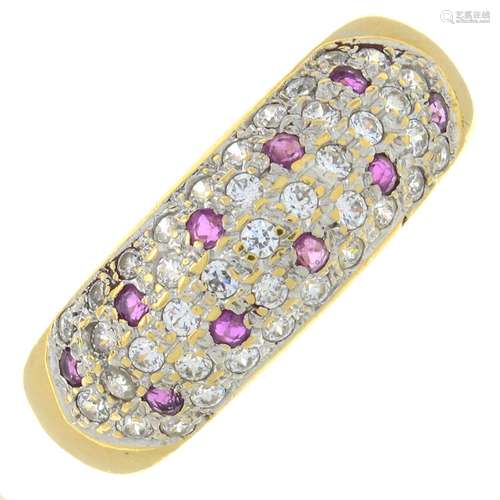 A ruby and pave-set diamond dress ring.Estimated total diamo...