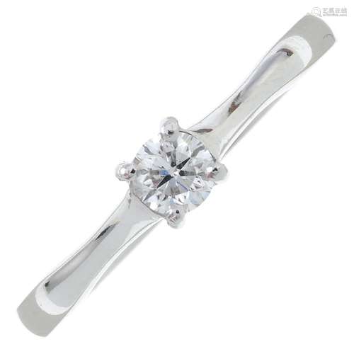 A platinum brilliant-cut diamond single-stone ring.Diamond e...