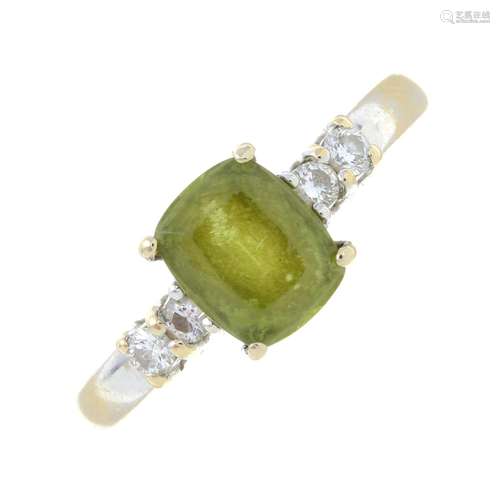 A peridot and brilliant-cut diamond ring.Estimated total dia...