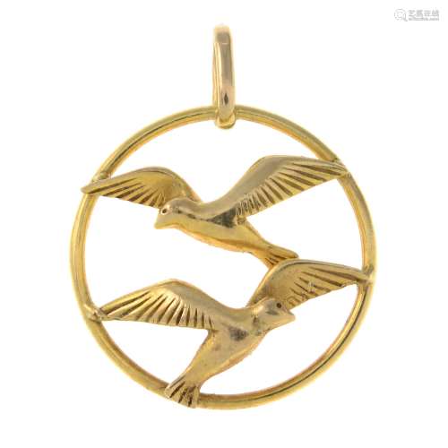 A 9ct gold openwork pendant, designed to depict two birds in...