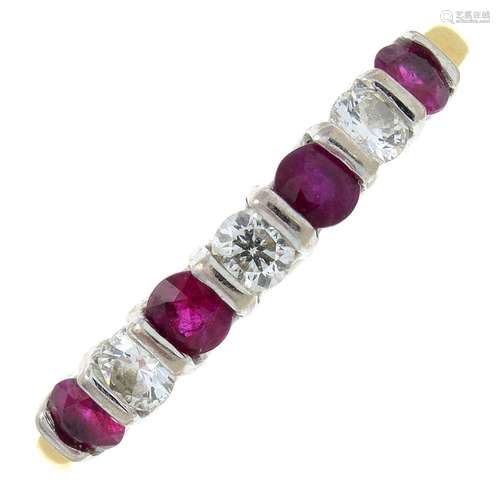 An 18ct gold diamond and ruby seven-stone ring.Estimated tot...