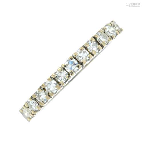 An 18ct gold single-cut diamond half eternity ring.Estimated...