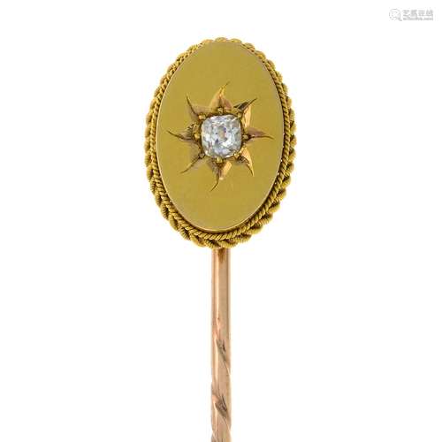 An early 20th century gold old-cut diamond stickpin.Length o...