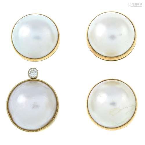 Three mabe pearl stud earrings, stamped 9CT, diameter 1.6cms...