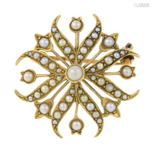 An early 20th century 15ct gold split pearl brooch.Stamped 1...