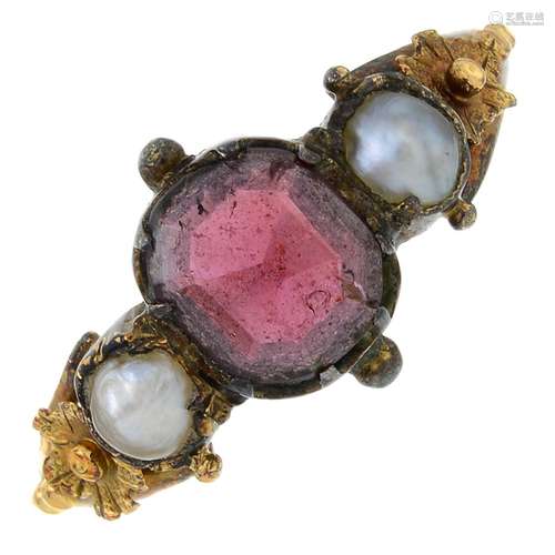 An early 20th century gold garnet and split pearl three-ston...