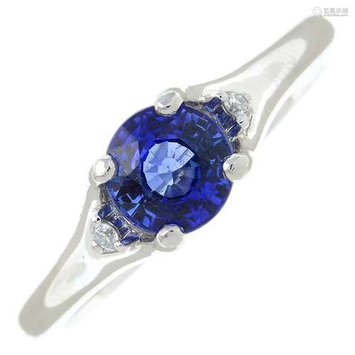 A platinum sapphire ring, with diamond accent shoulders.Sapp...