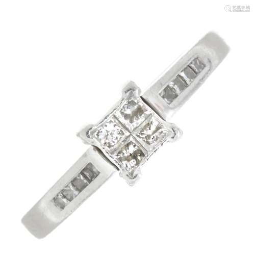 A platinum square-shape diamond cluster ring.Total diamond w...