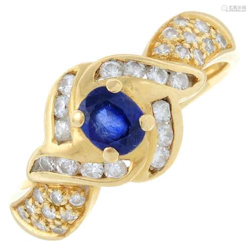 A sapphire and brilliant-cut diamond dress ring.Total diamon...