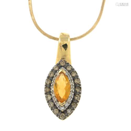 A citrine and diamond pendant, with snake-link chain.Estimat...