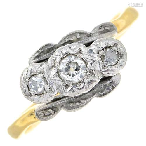 A circular-cut diamond three-stone ring.Estimated total diam...