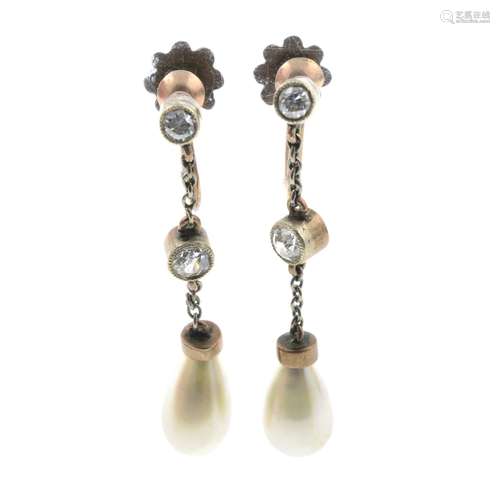 A pair of diamond and imitation pearl drop earrings.Estimate...