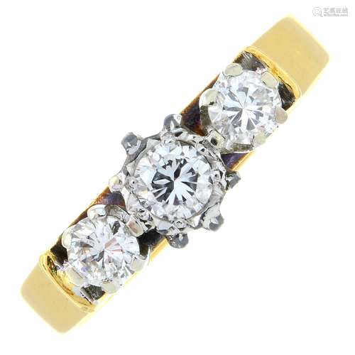 An 18ct gold brilliant-cut diamond three-stone ring.Estimate...