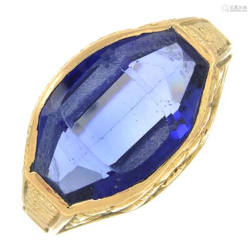 A synthetic sapphire dress ring, with embossed gallery.Ring ...