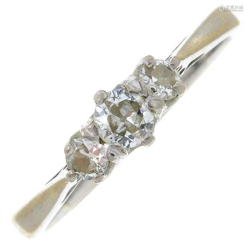 An 18ct gold diamond three-stone ring.Estimated total diamon...