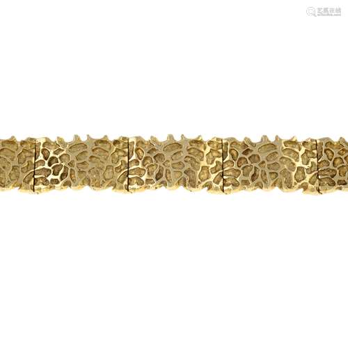 A 1970s 9ct gold textured link bracelet.Hallmarks for London...