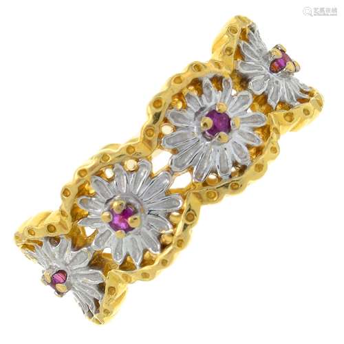 A ruby accent openwork bi-colour ring, with floral motif.Sta...