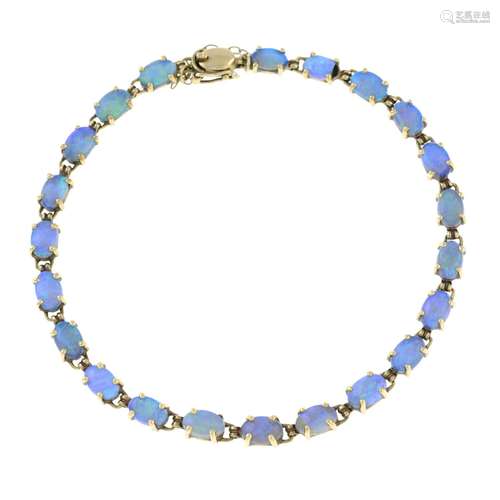 An opal line bracelet.Stamped 14K, 585.