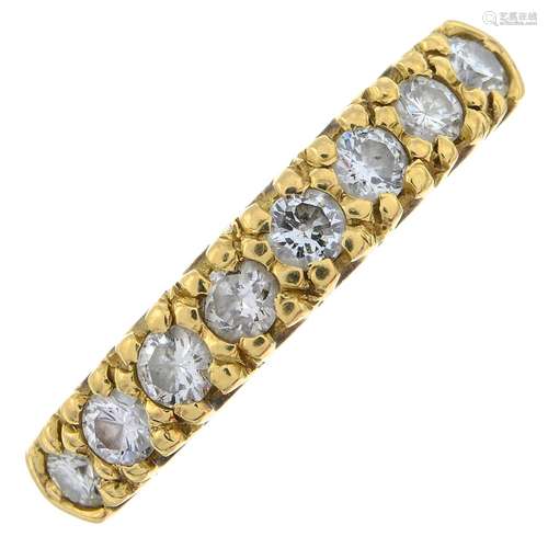 A brilliant-cut diamond half eternity ring.Estimated total d...