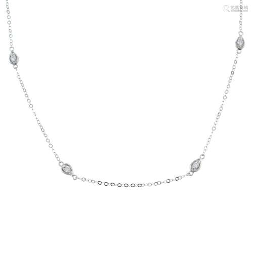 An 18ct gold two-row necklace, with diamond spacers.Total di...