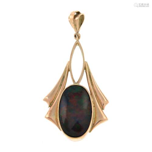 An early 20th century gold opal pendant.Length 3.7cms.