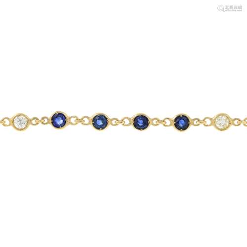 A sapphire and diamond line bracelet.Estimated total diamond...