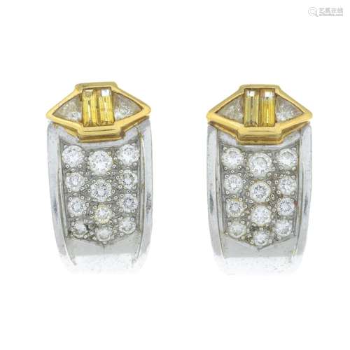 A pair of vari-cut diamond and citrine earrings.Estimated to...