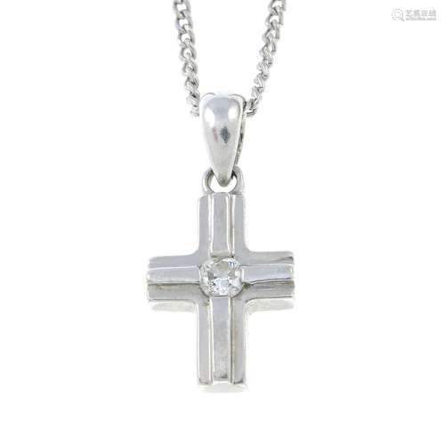 A platinum diamond accent cross pendant, with platinum chain...