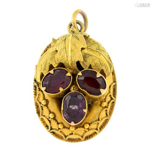 A late 19th century gold garnet memorial pendant.Length 2.7c...