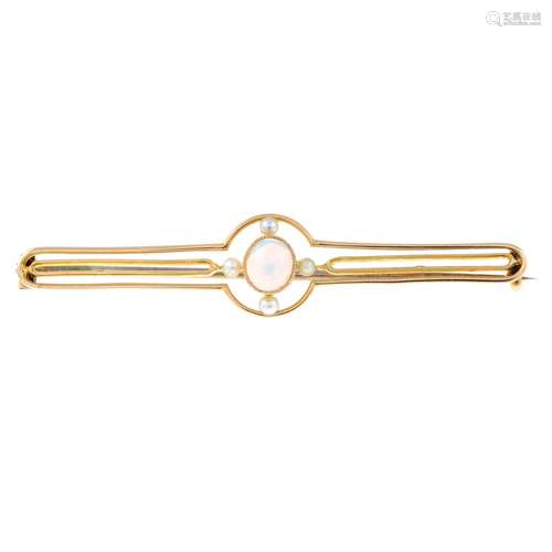 An early 20th century gold opal and seed pearl bar brooch.Le...