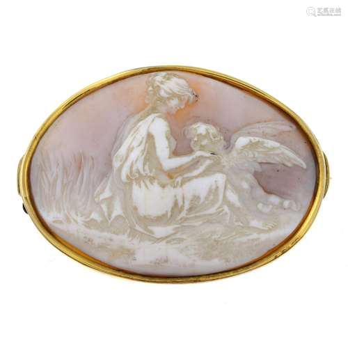 An early 20th century gold shell cameo brooch, carved to dep...